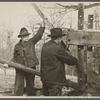 Demonstrating unique homemade cider press invented by man living on Crabtree Recreational Demonstration Area, Raleigh, North Carolina.