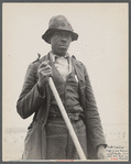 Negro workman [digging shipmast locust roots], Sandhills Land Utilization Project, North Carolina.