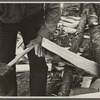 Splitting shingles with froe and maul on Wilson Cedar Forest, near Lebanon, Tennessee.