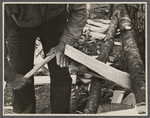 Splitting shingles with froe and maul on Wilson Cedar Forest, near Lebanon, Tennessee.