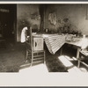Kitchen of Negro dwelling in slum area near House office building, Washington, D.C.