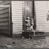 Small children in front of home, Georgetown, Washington, D.C.