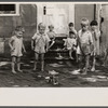 Poor children playing on sidewalk, Georgetown, Washington, D.C.
