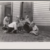 Poor children playing on sidewalk, Georgetown, Washington, D.C.