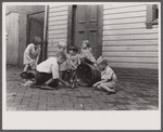 Poor children playing on sidewalk, Georgetown, Washington, D.C.