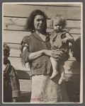 Mother and baby of family of nine living in field on U.S. Route 70 in Tennessee, near Tennessee River.