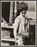 Twelve-year old girl of family of nine living in one-room hut built over the chassis of abandoned Ford truck in open field on U.S. Route 70 between Camden and Bruceton, Tennessee. Near backward Tennessee section.