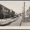 Radburn, New Jersey, a privately financed model town which furnished some of the ideas for the Suburban Resettlement Administration's Greenbelt towns. A roadway, not a thoroughfare, back of a unit of houses.