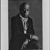 Portrait of James Baldwin in a suit