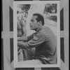 Man seated outside