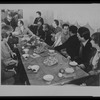James Baldwin at meal with others at Issyk-Kul Forum