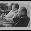 James Baldwin seated with brother, David