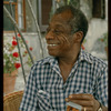 James Baldwin in checkered shirt in Saint-Paul