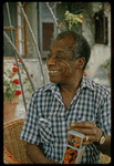 James Baldwin in checkered shirt in Saint-Paul