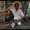 James Baldwin outdoors in straw hat