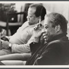 James Baldwin seated with brother, David