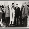 James Baldwin standing with others at Issyk-Kul Forum