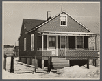 Cheap false brick tarpaper-covered wooden house typical of subdivision sections in Franklin Township, Amwell Road, West New Brunswick near Derussey land, New Jersey.