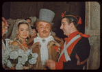 Bidú Sayão, Salvatore Baccaloni, and Giuseppe Valdengo in costume for L'elisir d'amore at the Metropolitan Opera