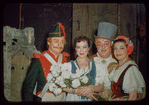Frank Valentino, Patrice Munsel, Salvatore Baccaloni, and Paula Lenchner in costume for L'elisir d'amore at the Metropolitan Opera
