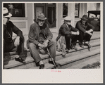 Fair at Albany, Vermont. The old timers take to the steps of the general store.