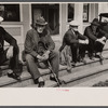 Fair at Albany, Vermont. The old timers take to the steps of the general store.