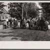 Start of the two-man wheelbarrow and barrel race. Fair at Albany, Vermont.
