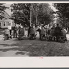 Start of the two-man wheelbarrow and barrel race. Fair at Albany, Vermont.
