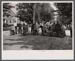 Start of the two-man wheelbarrow and barrel race. Fair at Albany, Vermont.