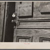 Padlocked doors on tenement houses are not uncommon in the French section with mills closed down, Amoskeag, Manchester, New Hampshire.
