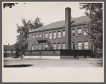 Factory and parking lot. Manchester, New Hampshire.