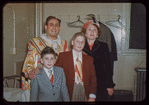 Richard Tucker in costume for Manon Lescaut at the Metropolitan Opera, with his family