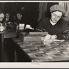 Head of U.A.W. (United Auto Workers) Women's Auxiliary kitchen set up in a restaurant opposite Fisher body plant number three. Strikers were fed here and trucks of food were sent from here to the men in factories twice daily. Flint, Michigan.