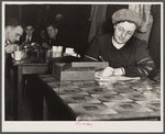 Head of U.A.W. (United Auto Workers) Women's Auxiliary kitchen set up in a restaurant opposite Fisher body plant number three. Strikers were fed here and trucks of food were sent from here to the men in factories twice daily. Flint, Michigan.