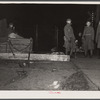 National Guard with machine gun overlooking Chevrolet factories number nine and number four. Flint, Michigan.