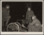 National Guard with machine gun overlooking Chevrolet factories number nine and number four. Flint, Michigan.
