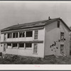New England hurricane. Chicken house damaged by the debris from a second chicken house which was demolished between Worcester and Amherst, Massachusetts.
