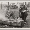 Boys smoking log. Reedsville, West Virginia.