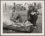 Boys smoking log. Reedsville, West Virginia.