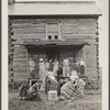 Children outside Fairfax log cabin. Reedsville, West Virginia.