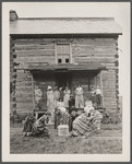 Children outside Fairfax log cabin. Reedsville, West Virginia.
