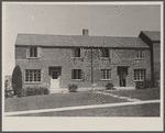 Completed brick-veneer row house at Greenbelt, Maryland.