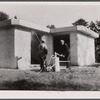 Whitewashing rammed earth house near Birmingham, Alabama.