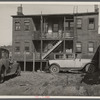 Rear of apartment house between Juneau and McKinley Streets. Milwaukee, Wisconsin.