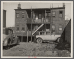 Rear of apartment house between Juneau and McKinley Streets. Milwaukee, Wisconsin.