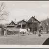 Rear of group of houses in 900 block on West Clybourn Street. Milwaukee, Wisconsin.