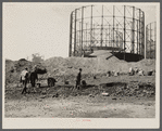 Unemployed men salvaging coke from industrial cinder pile at Milwaukee Railroad shops. Wisconsin.