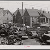 Junk, with living quarters close by. Milwaukee, Wisconsin.