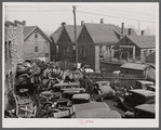 Junk, with living quarters close by. Milwaukee, Wisconsin.