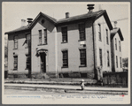 Exterior of Cincinnati school house condemned 37 years ago as such, now housing 12-15 white families.